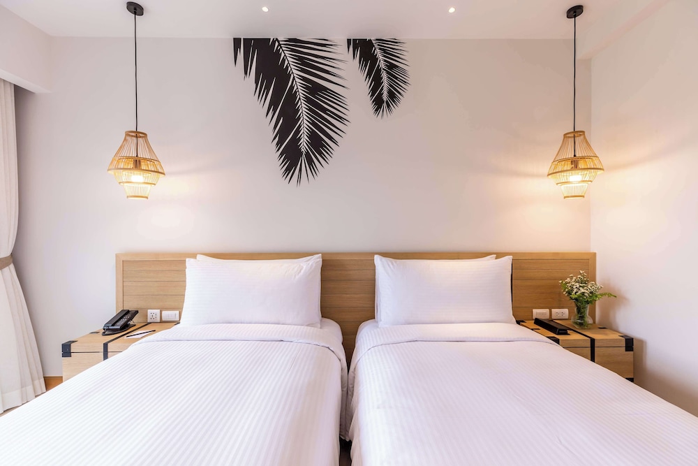 outrigger surin beach resort