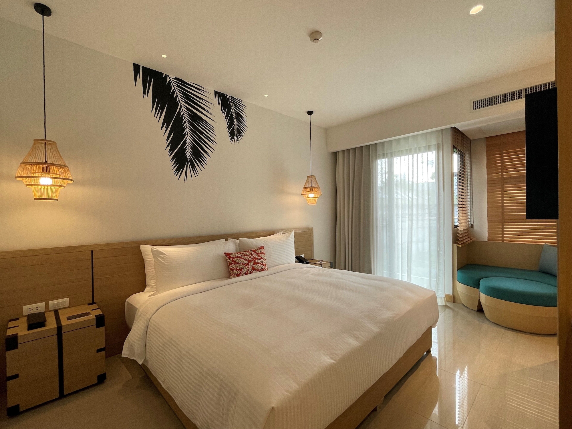 outrigger surin beach resort