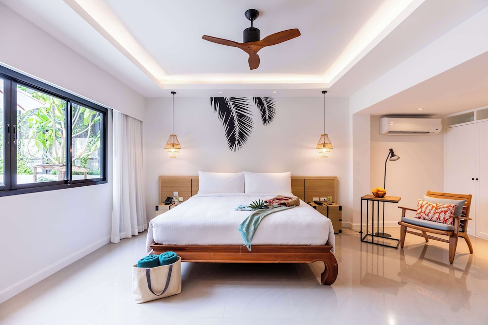 outrigger surin beach resort