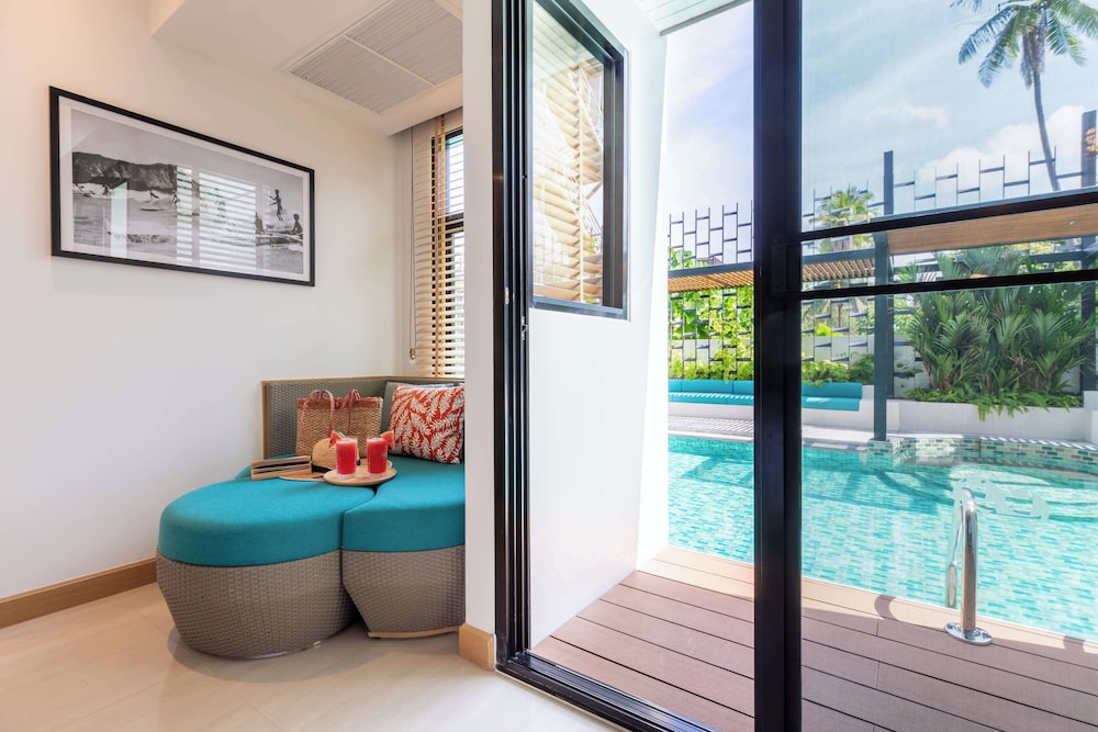 outrigger surin beach resort
