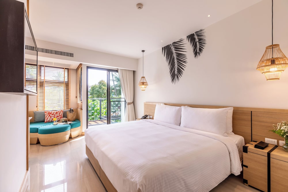 outrigger surin beach resort