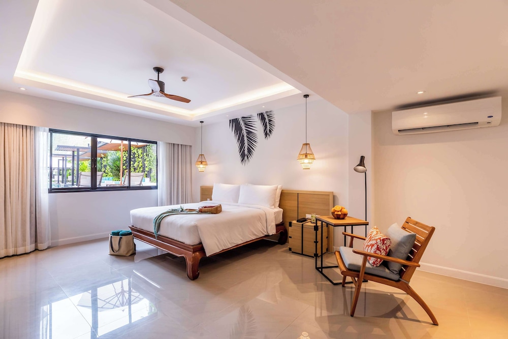 outrigger surin beach resort