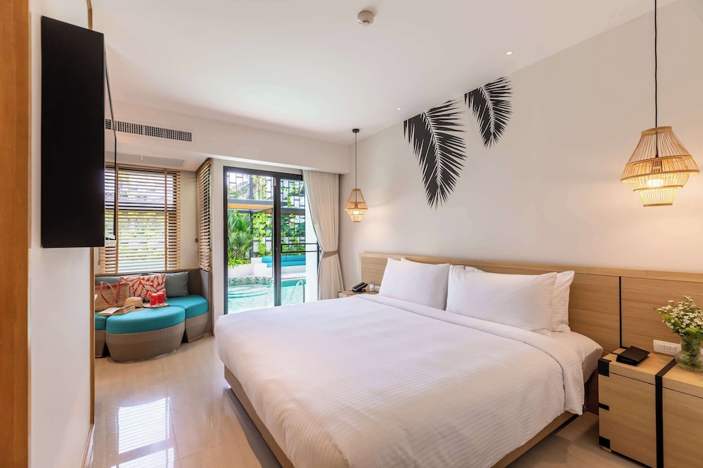 outrigger surin beach resort