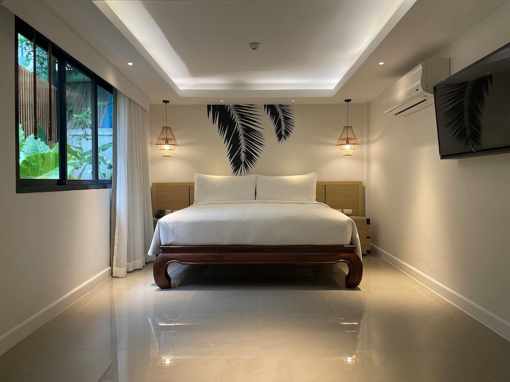 outrigger surin beach resort
