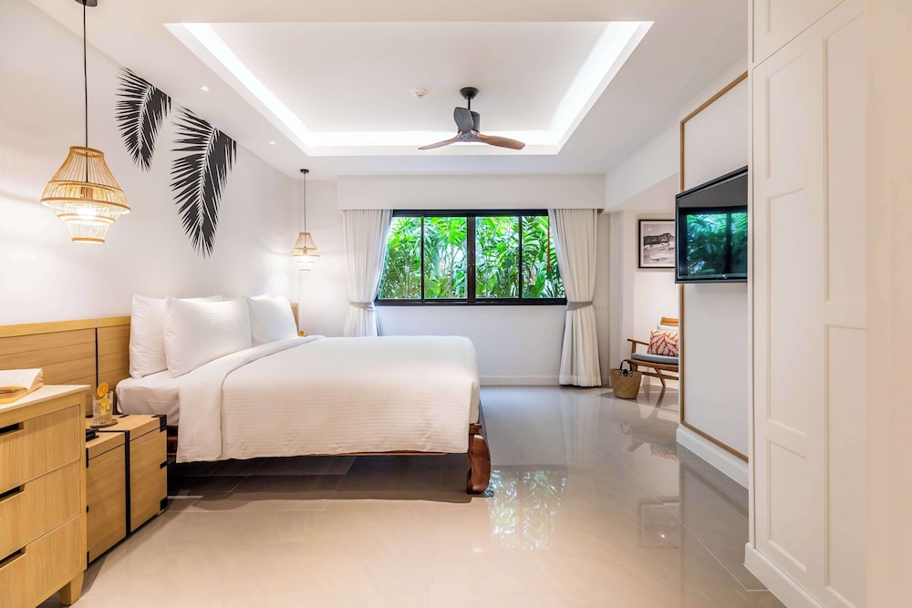 outrigger surin beach resort
