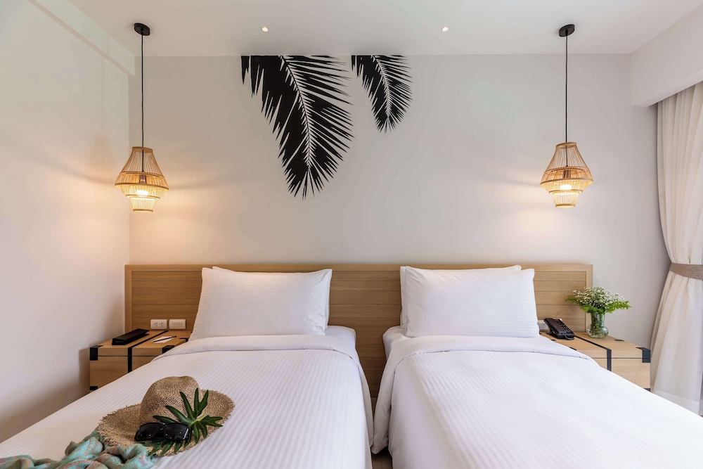 outrigger surin beach resort