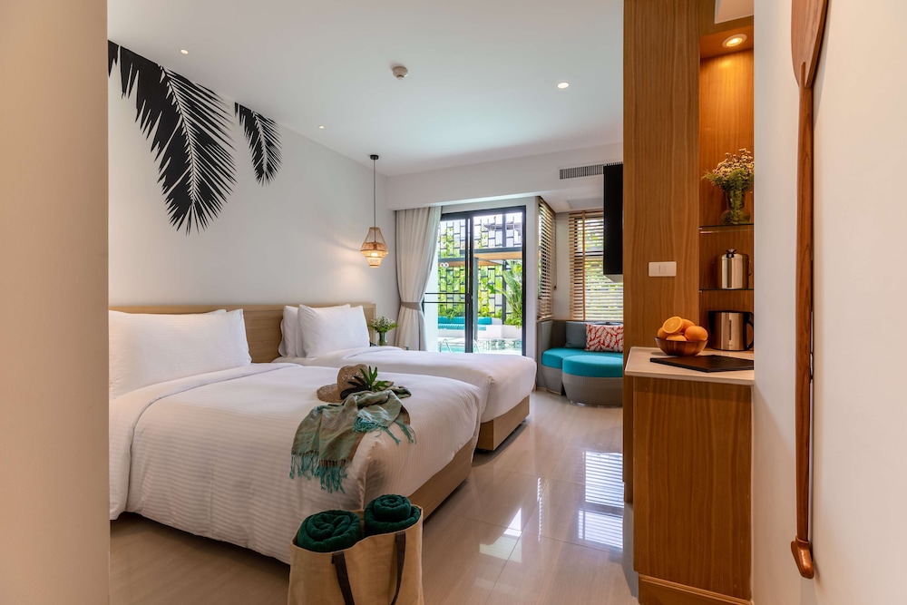 outrigger surin beach resort