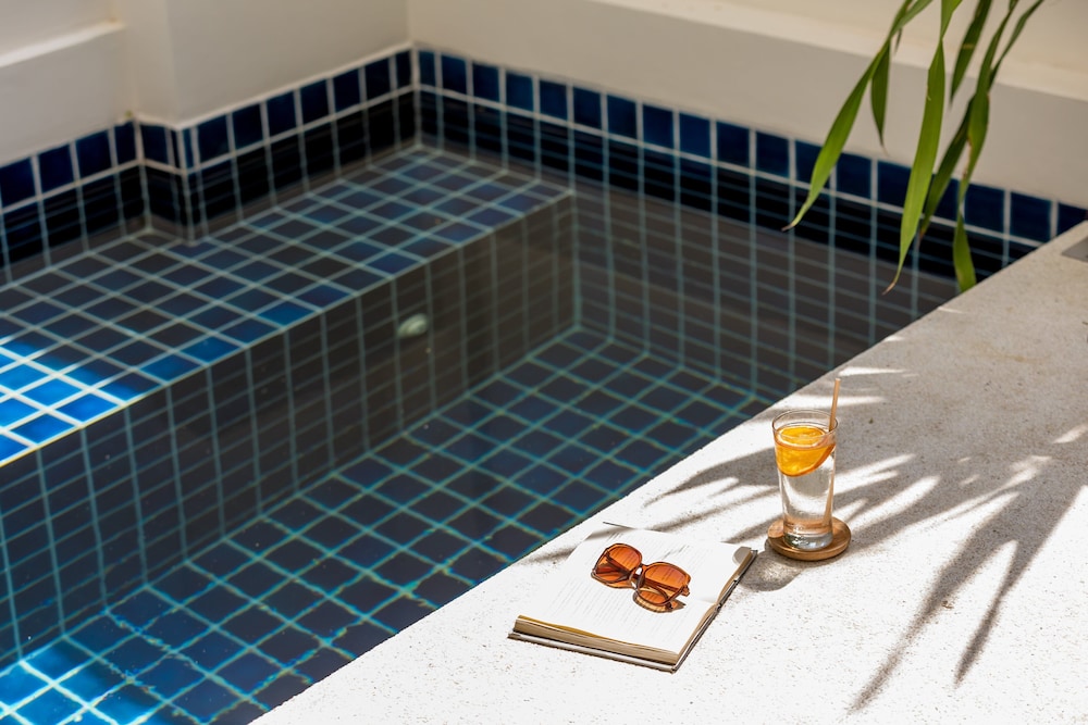 outrigger surin beach resort