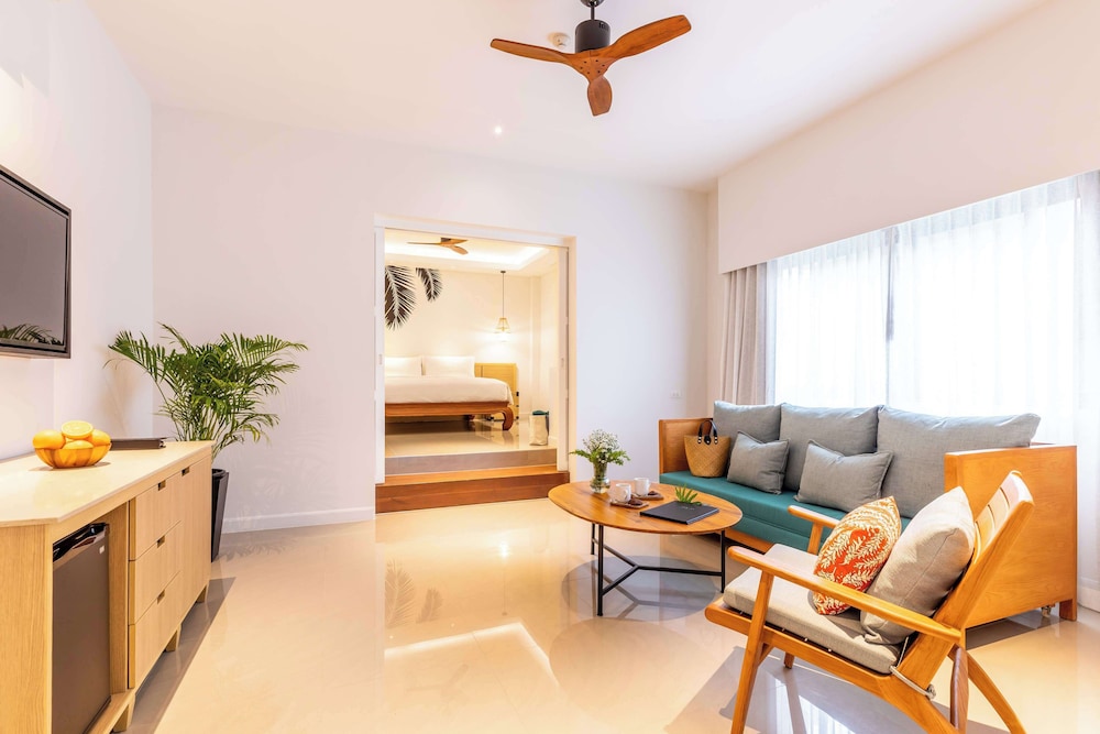 outrigger surin beach resort