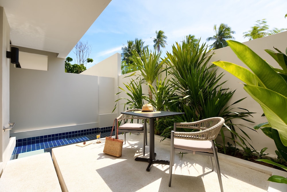 outrigger surin beach resort