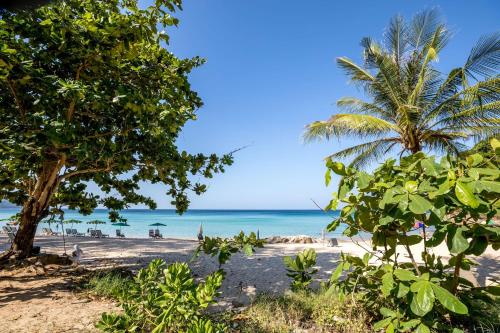 outrigger surin beach resort