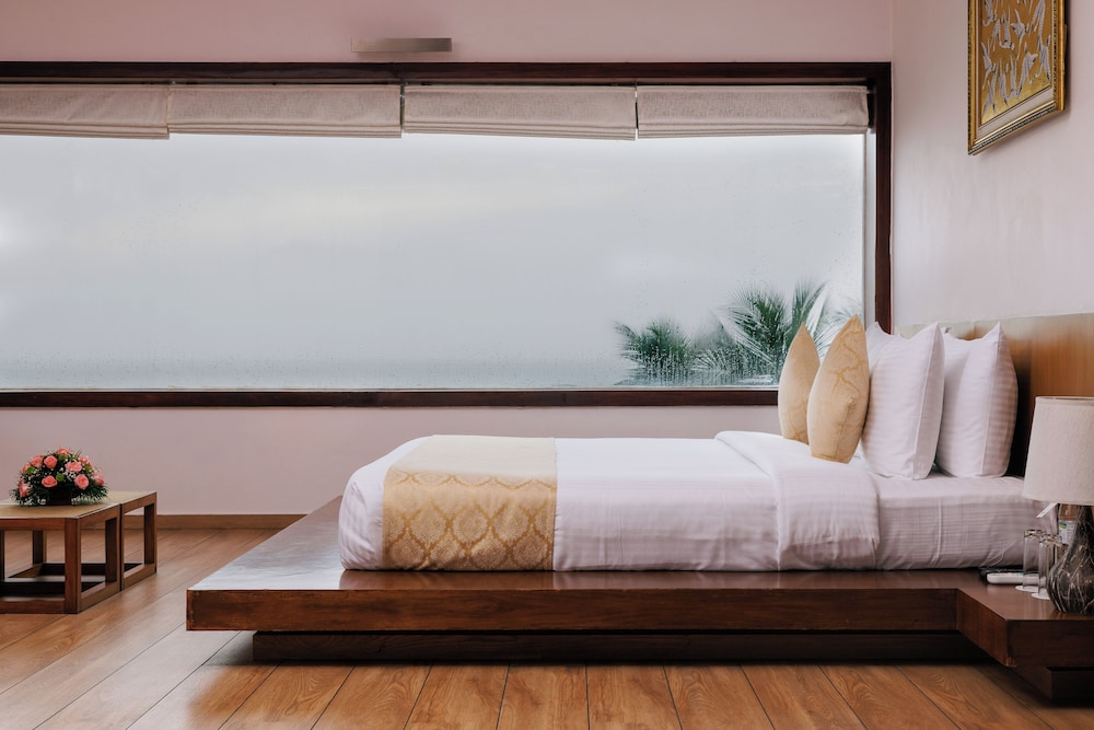 gokulam grand turtle on the beach