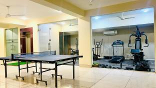 olive service apartment golf course road