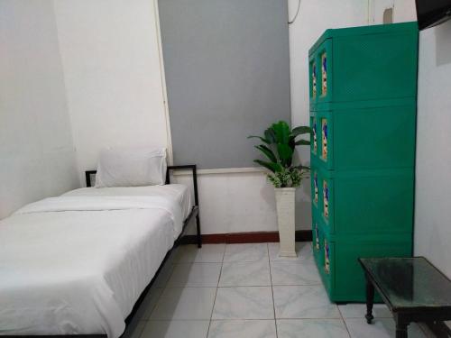 ombai guest house 27 syariah mitra reddoorz