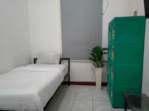ombai guest house 27 syariah mitra reddoorz
