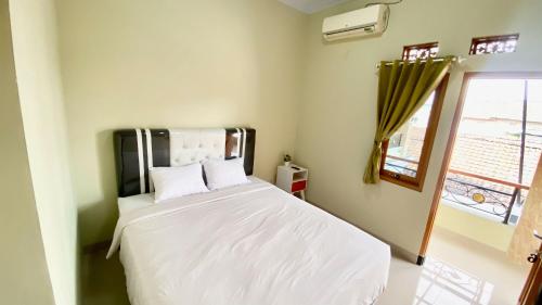 madina guest house syariah near gembira loka zoo yogyakarta mitra reddoorz