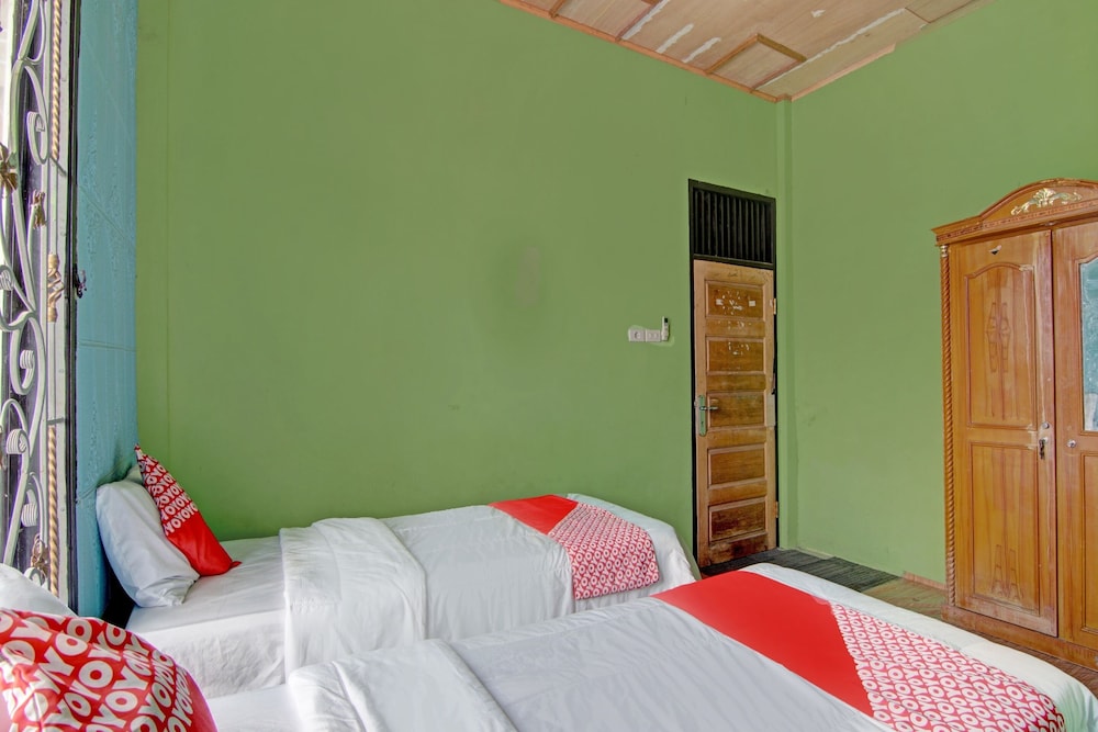 oyo 92872 swakarya guest house
