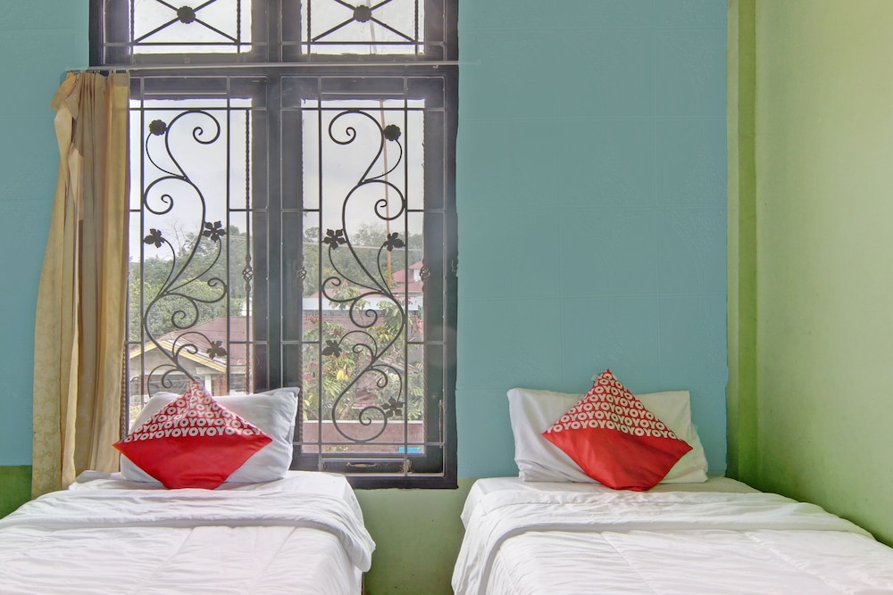 oyo 92872 swakarya guest house