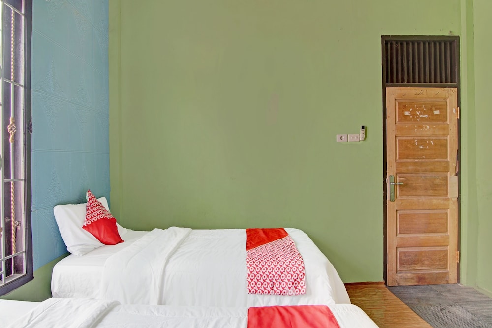 oyo 92872 swakarya guest house
