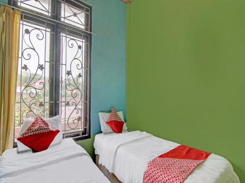 oyo 92872 swakarya guest house