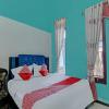 oyo 92872 swakarya guest house