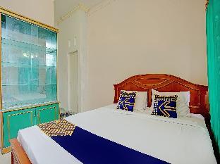 spot on 92905 sutomo residence syariah