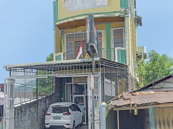 spot on 92905 sutomo residence syariah