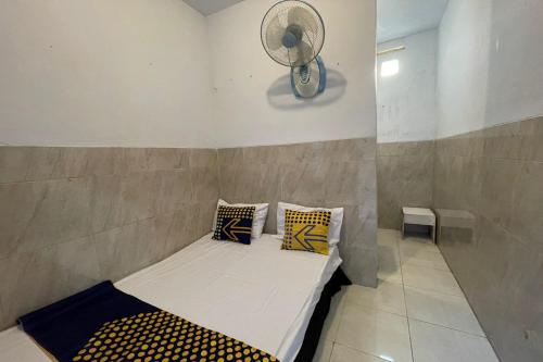 spot on 93035 karmans sari homestay syariah