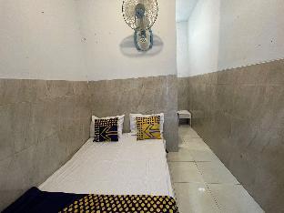 spot on 93035 karmans sari homestay syariah