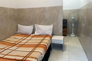 spot on 93035 karmans sari homestay syariah