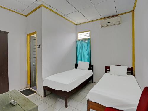 spot on 92446 penginapan aina syariah