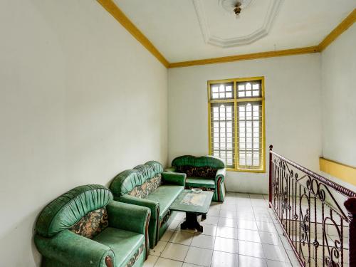 spot on 92446 penginapan aina syariah