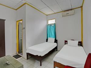 spot on 92446 penginapan aina syariah
