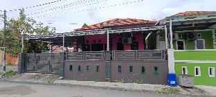 spot on 92466 adam kost syariah