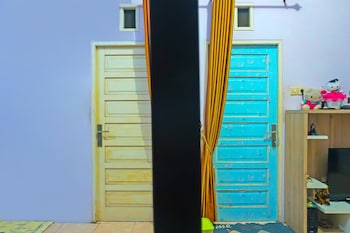 spot on 92466 adam kost syariah