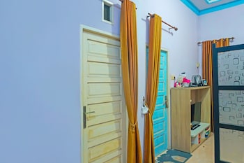 spot on 92466 adam kost syariah