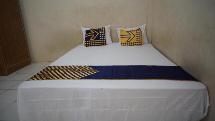 spot on 92860 hunian 99