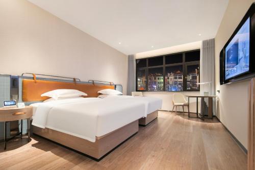 echarm hotel jingzhou honghu long street