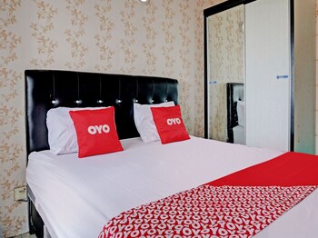 collection o 92967 apartement sentraland karawang by rda living