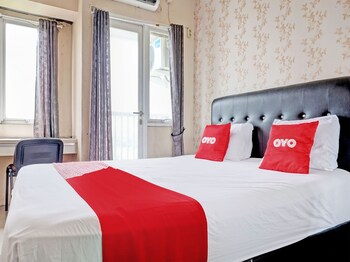 collection o 92967 apartement sentraland karawang by rda living