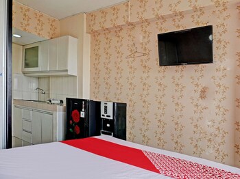 collection o 92967 apartement sentraland karawang by rda living