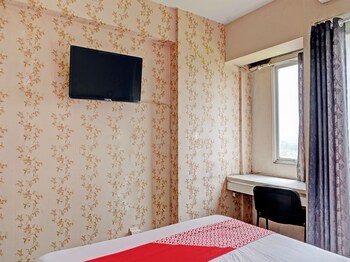 collection o 92967 apartement sentraland karawang by rda living