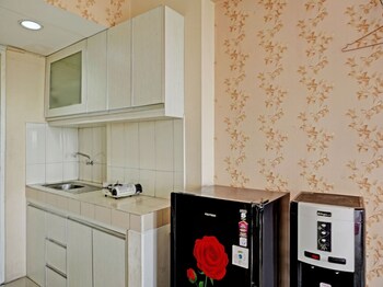 collection o 92967 apartement sentraland karawang by rda living