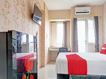 collection o 92967 apartement sentraland karawang by rda living