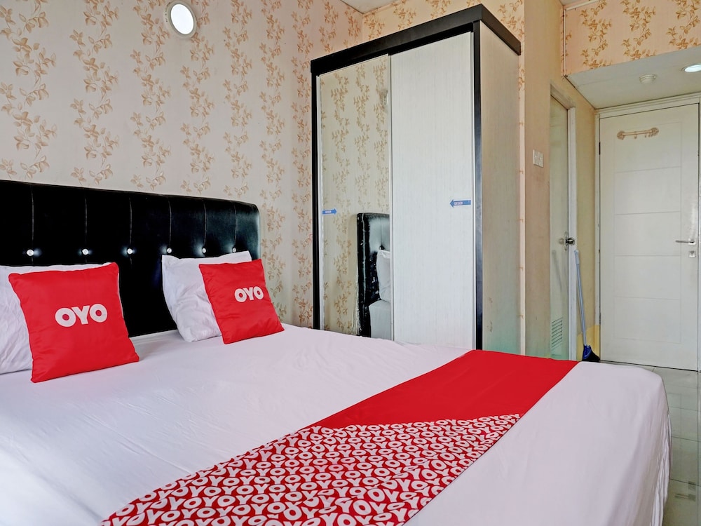 collection o 92967 apartement sentraland karawang by rda living