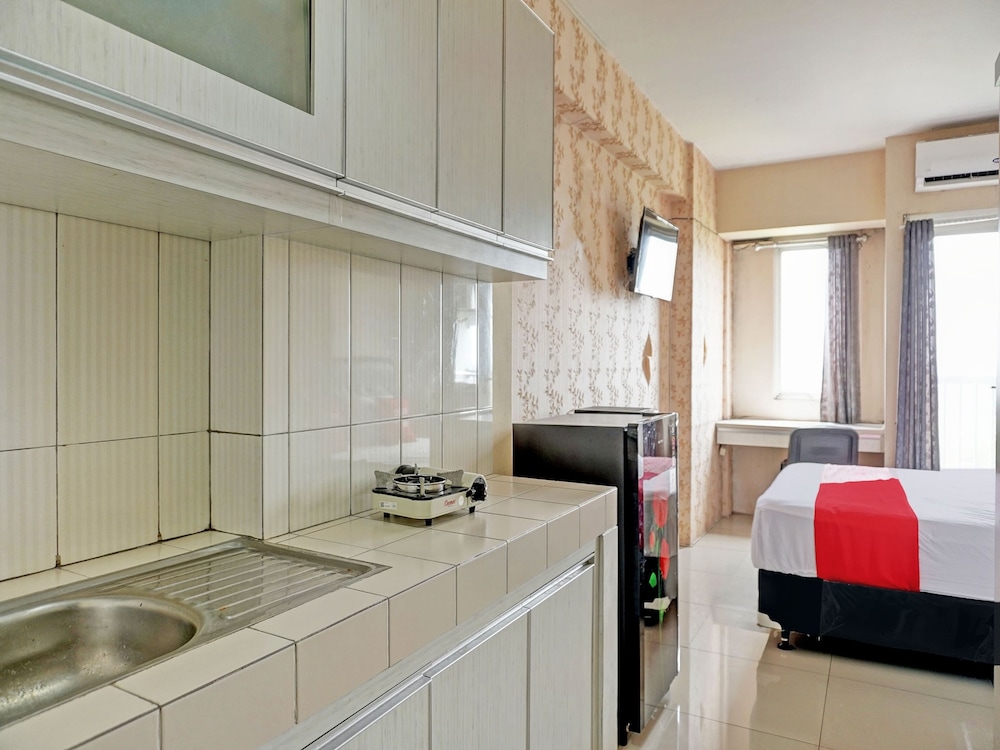 collection o 92967 apartement sentraland karawang by rda living