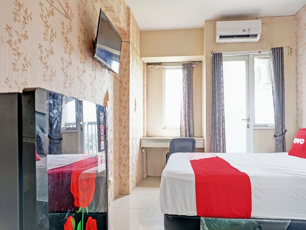 collection o 92967 apartement sentraland karawang by rda living