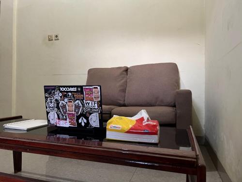 spot on 93001 losmen arkansas syariah