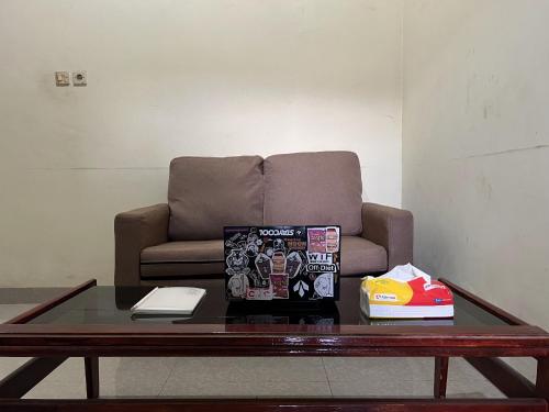 spot on 93001 losmen arkansas syariah