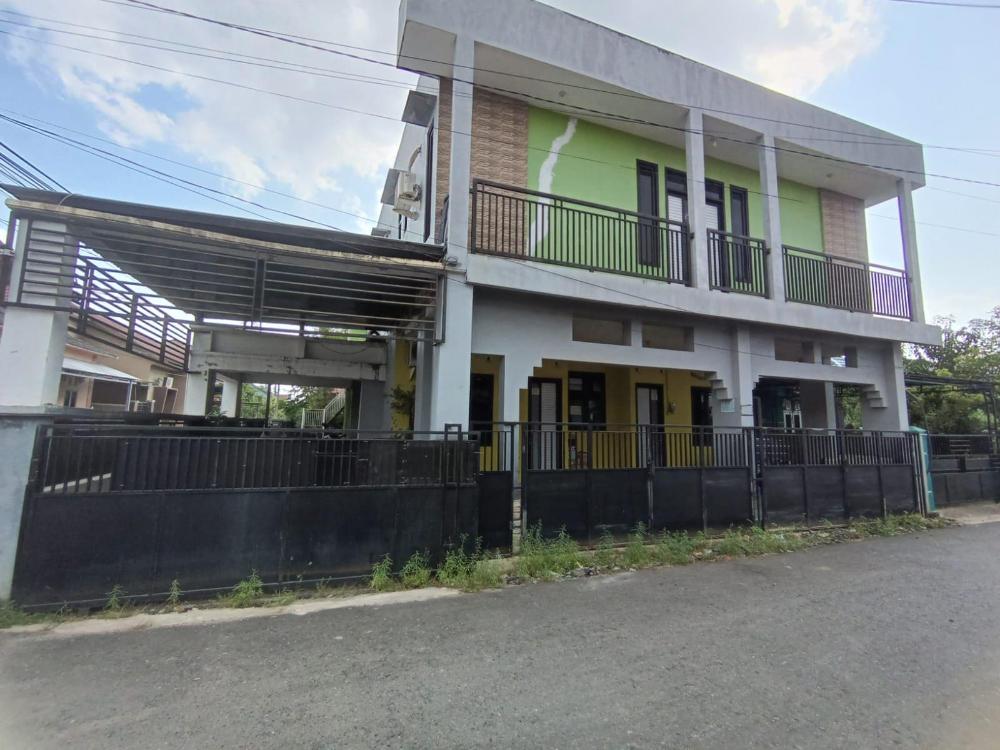 spot on 93001 losmen arkansas syariah